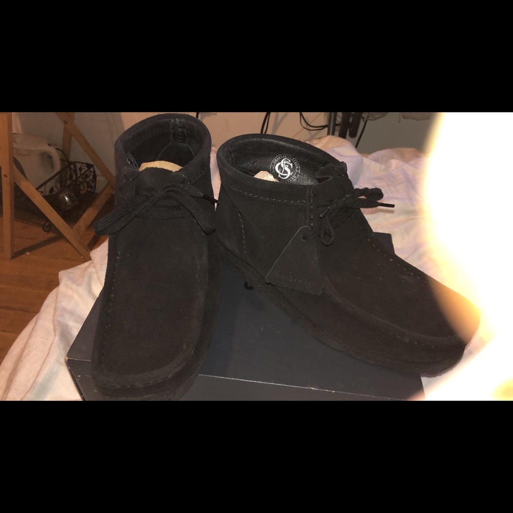 Brand new black suede Clark wallabies never worn!!